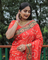 Trendy Bandhej Orange Color Soft Silk Saree